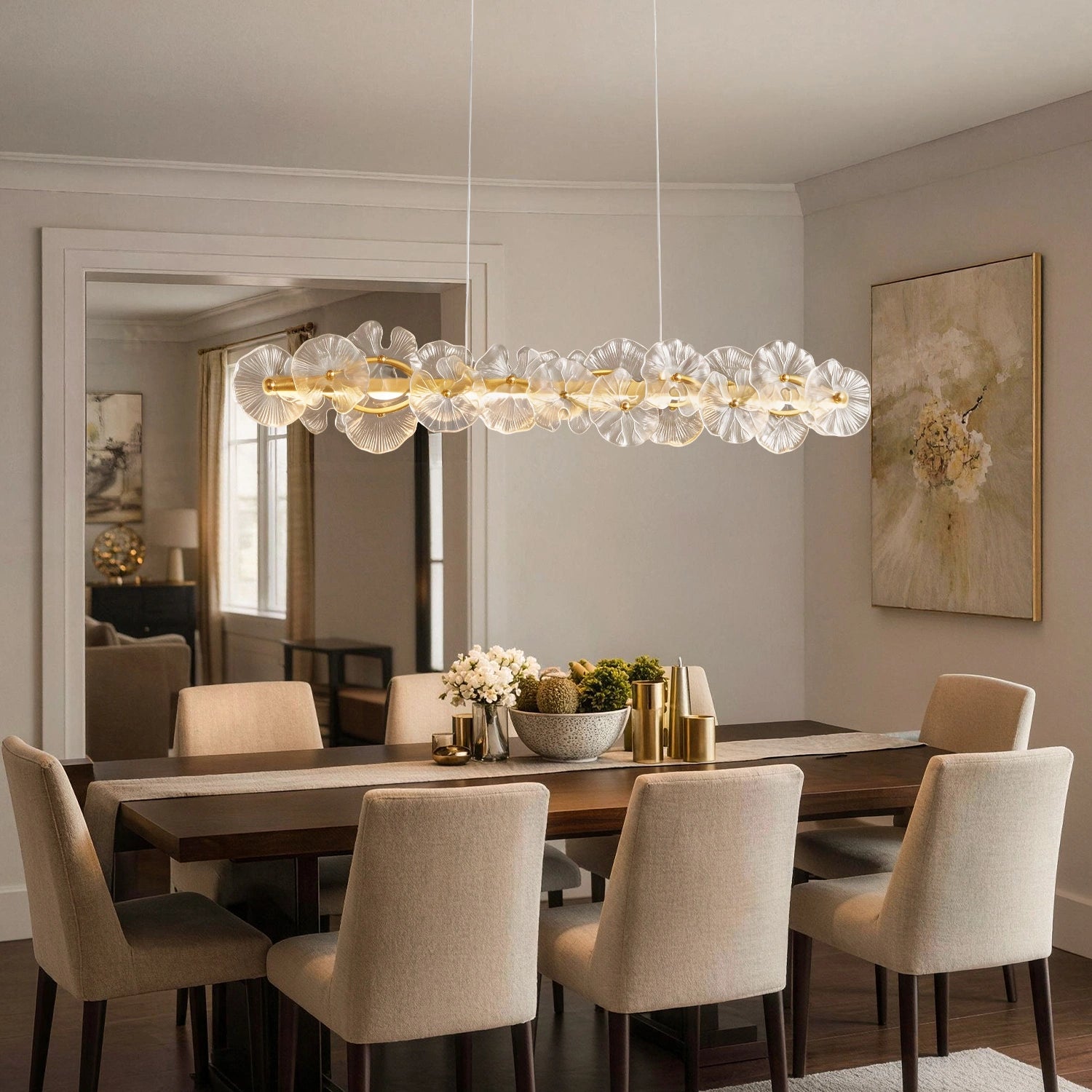 Contemporary Linear Glass Flower Chandelier centered in a bright, mid-century modern dining room with minimalist decor and white walls. Sofary Lighting
