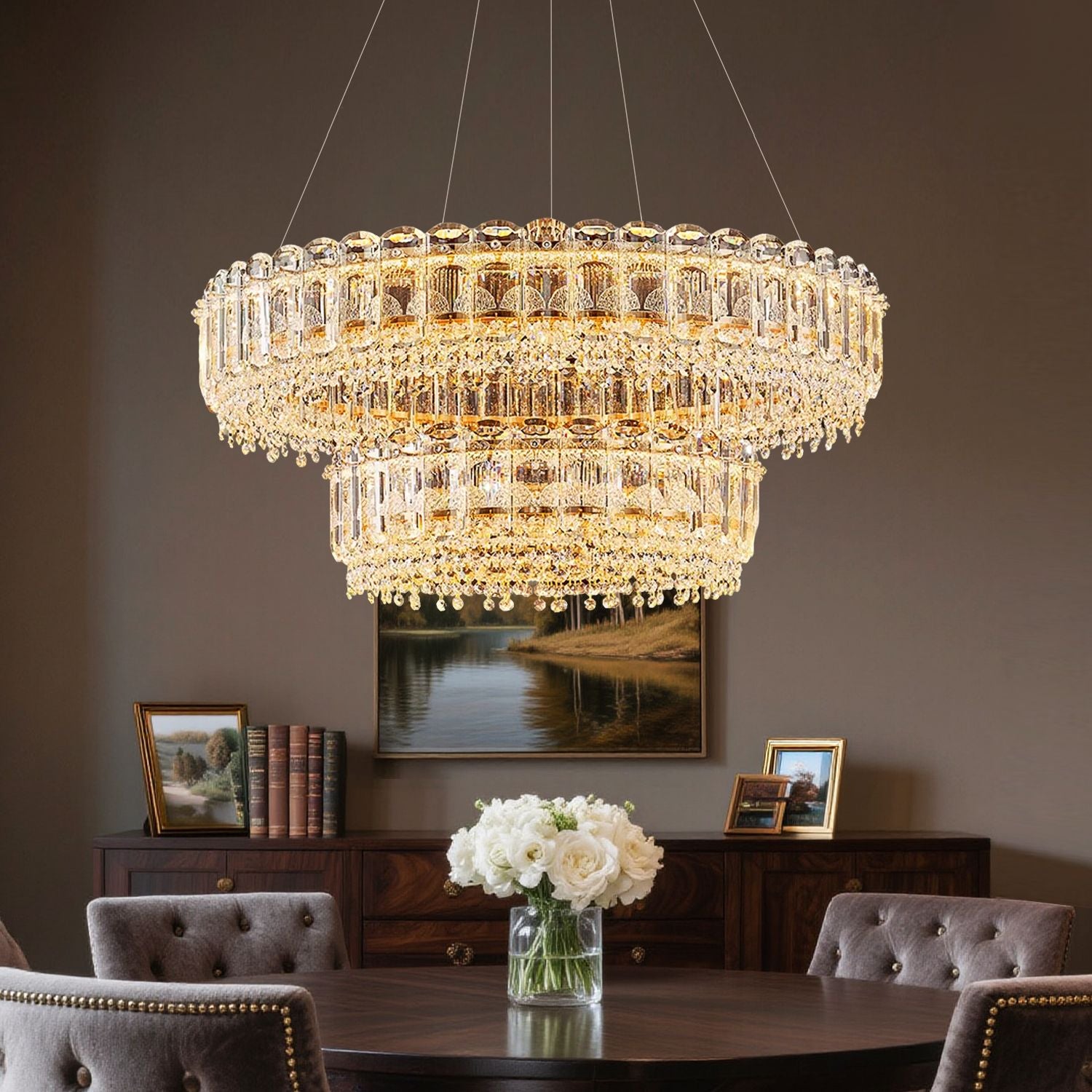 Empire Modern Luxury Gold K9 Crystal Double Tiered Three-Color Dimming Chandelier casts warm, adjustable light over a stylish dining room, highlighting the double-tiered crystal design and enhancing the cozy ambiance with floral accents