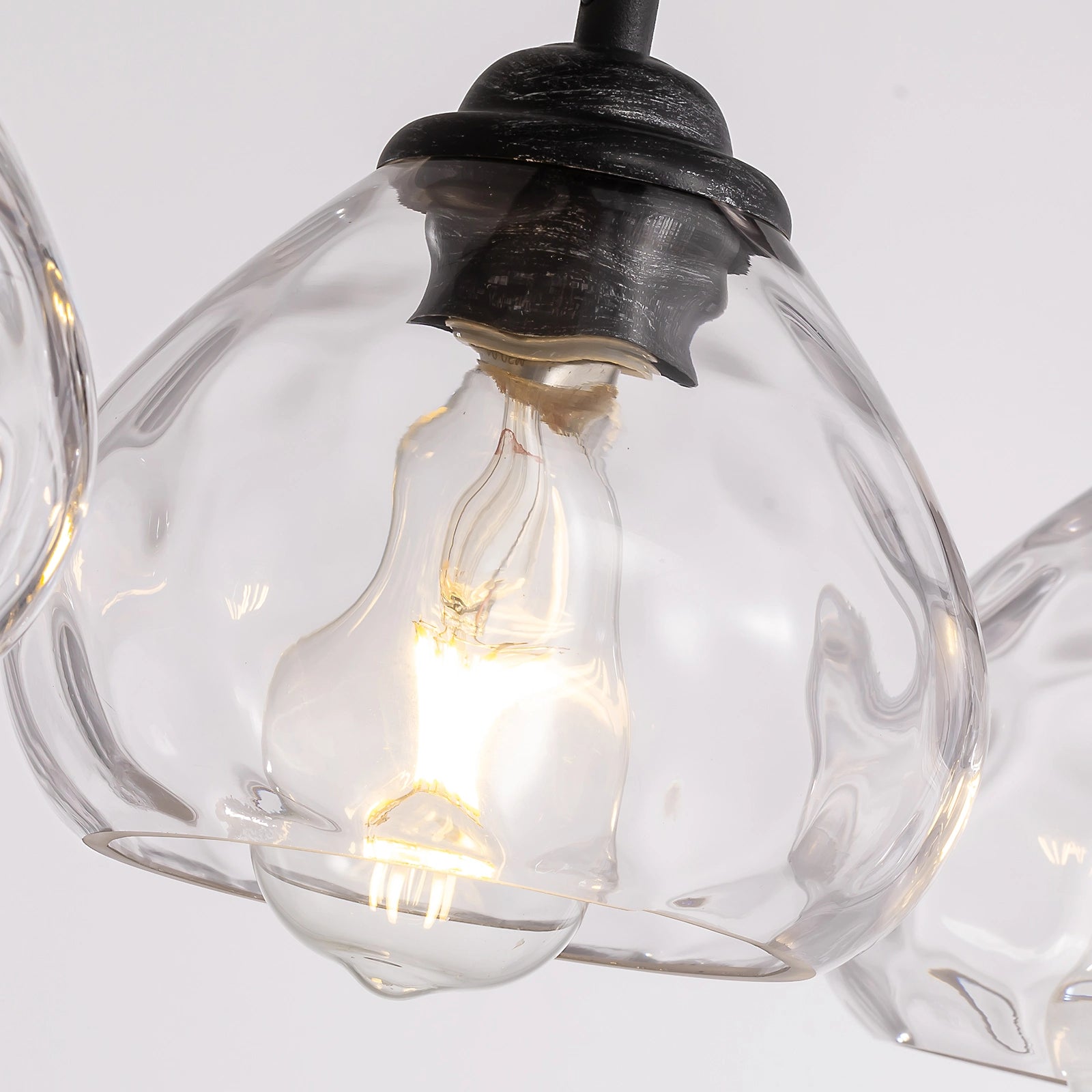 close-up-of-farmhouse-chic-crystal-glass-pendant-chandelier-sofary-lighting