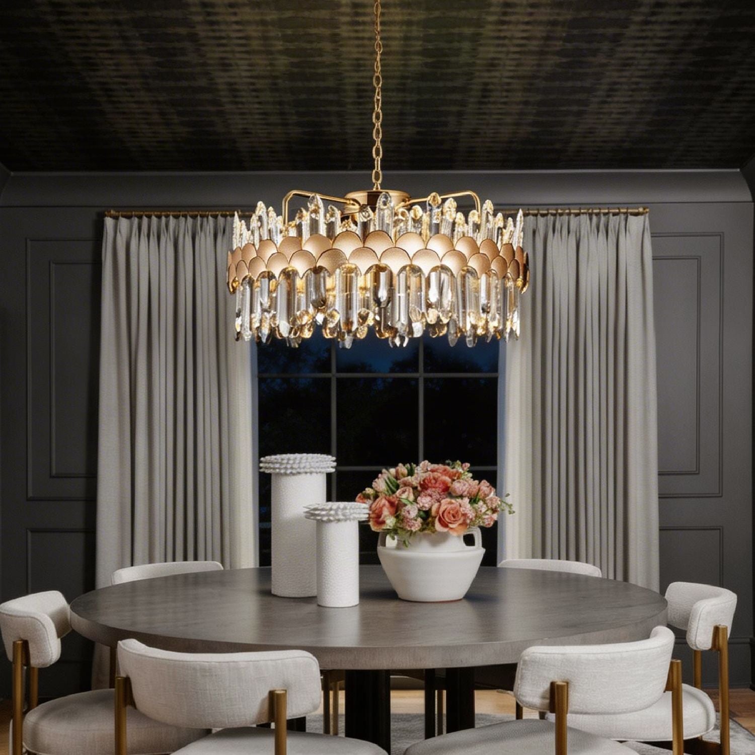 round gold crystal chandelier creating warm ambient lighting in modern dining room at night | Sofary Lighting