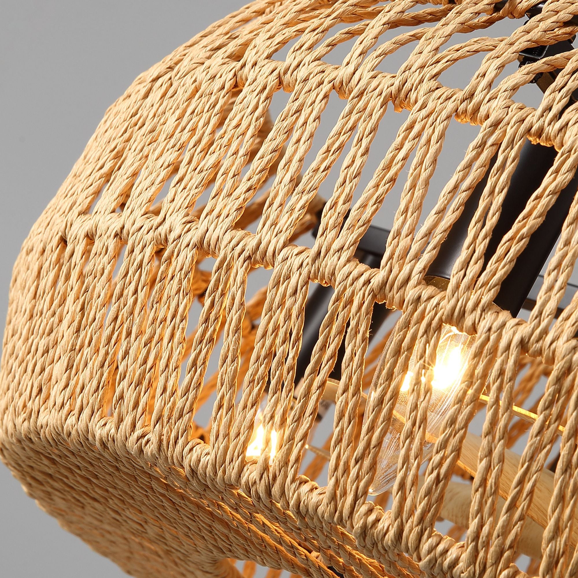 Close-up of Haven’s hand-woven rattan cage — intricate natural rope texture, durable boho craftsmanship, soft light diffusion | Sofary Lighting