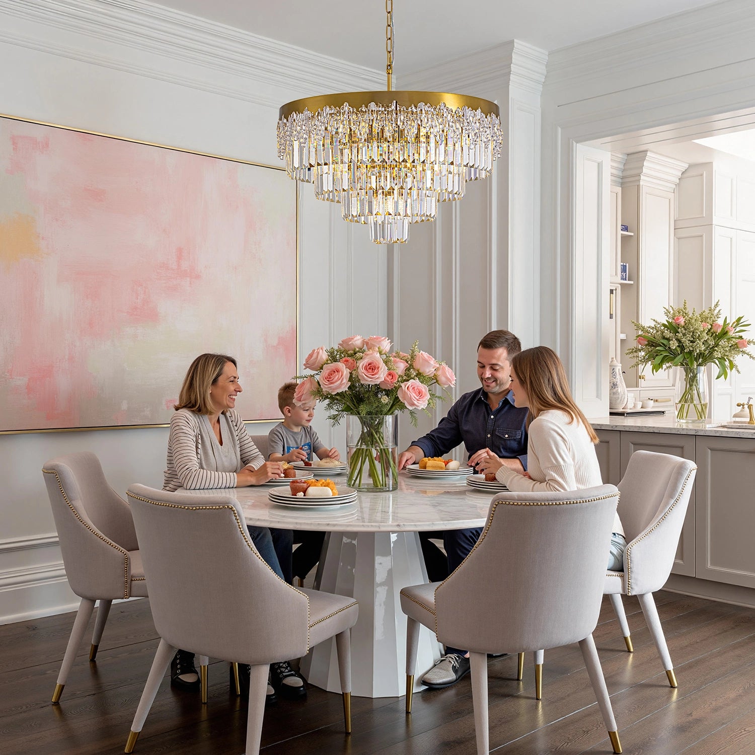 lumina-gold-crystal-tiered-chandelier-hanging-above-a-dining-table-sofary-lighting