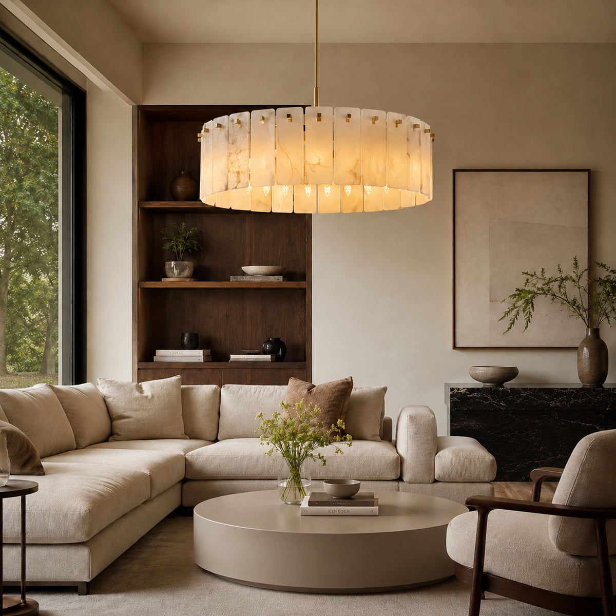 lunareth-modern-luxury-gold-alabaster-drum-chandelier-above-living-room-sofary-lighting