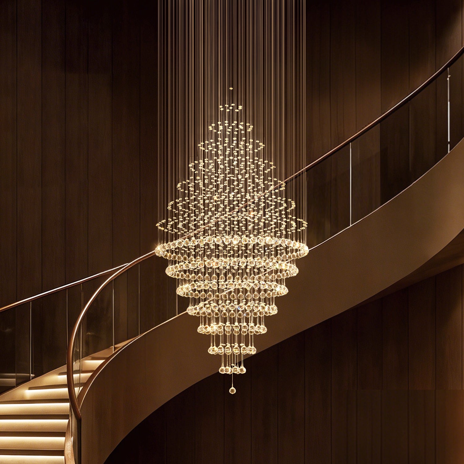 luxury modern round crystal chandelier staircase lighting fixture with spiral crystal strands hanging over curved staircase | Sofary Lighting