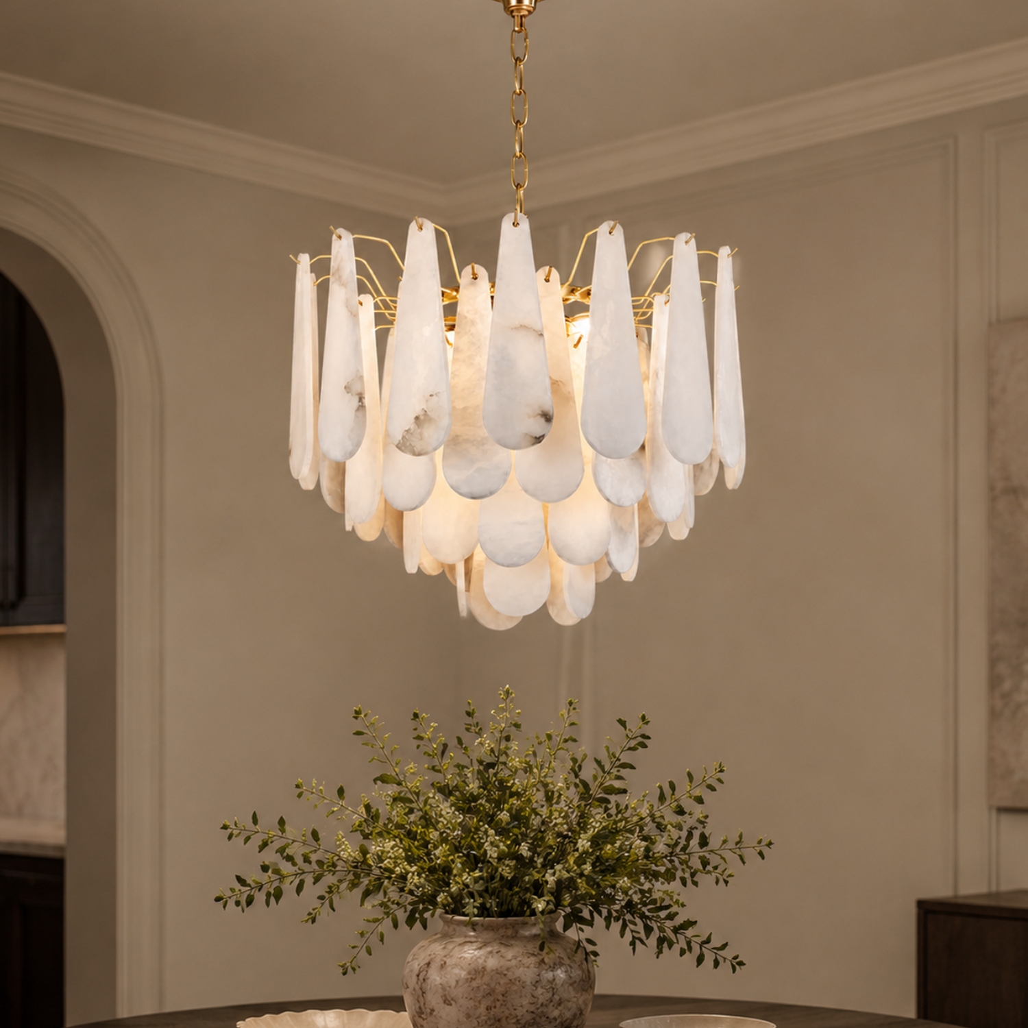 Marivelle gold alabaster tiered chandelier in a dining room