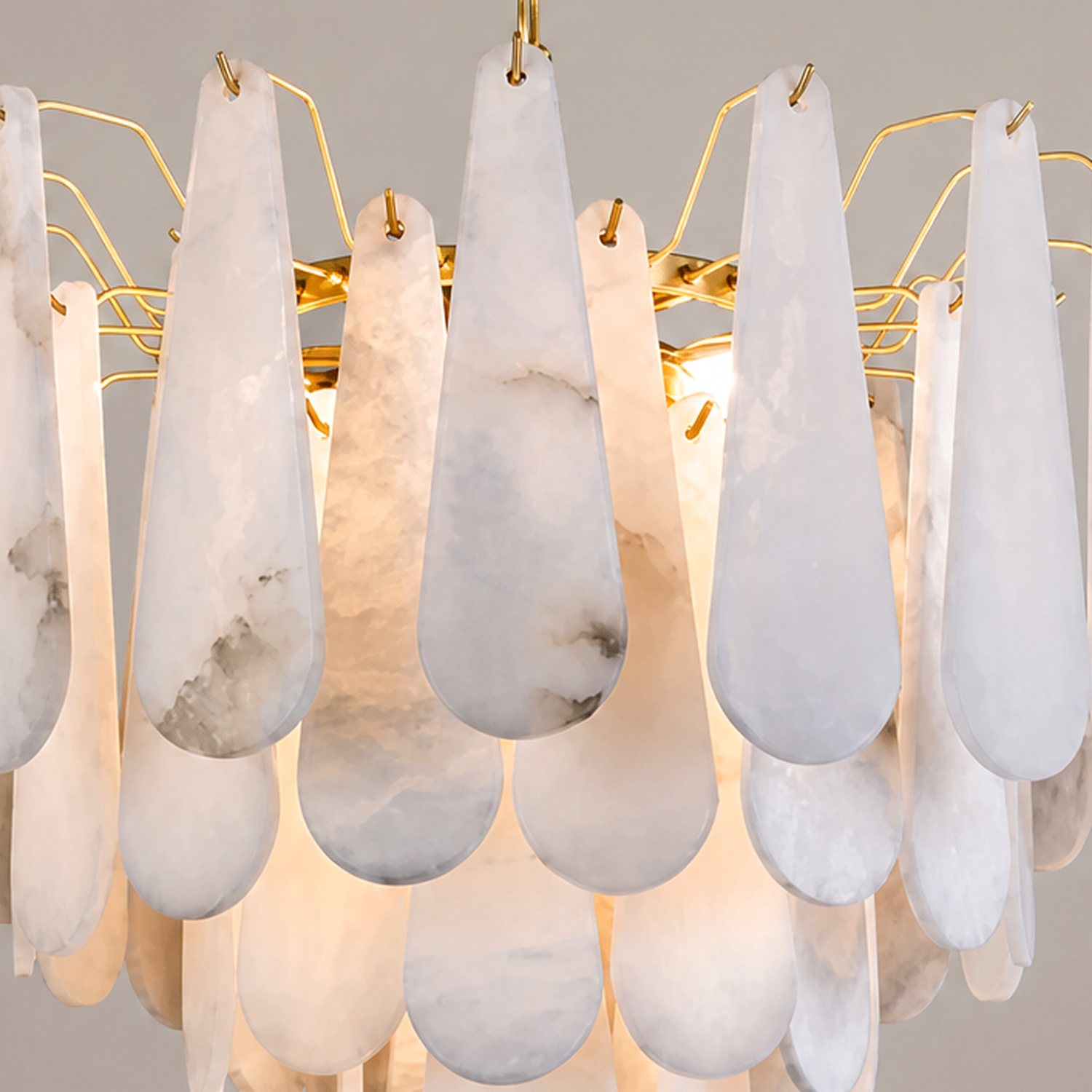 Natural alabaster panels and gold frame detail
