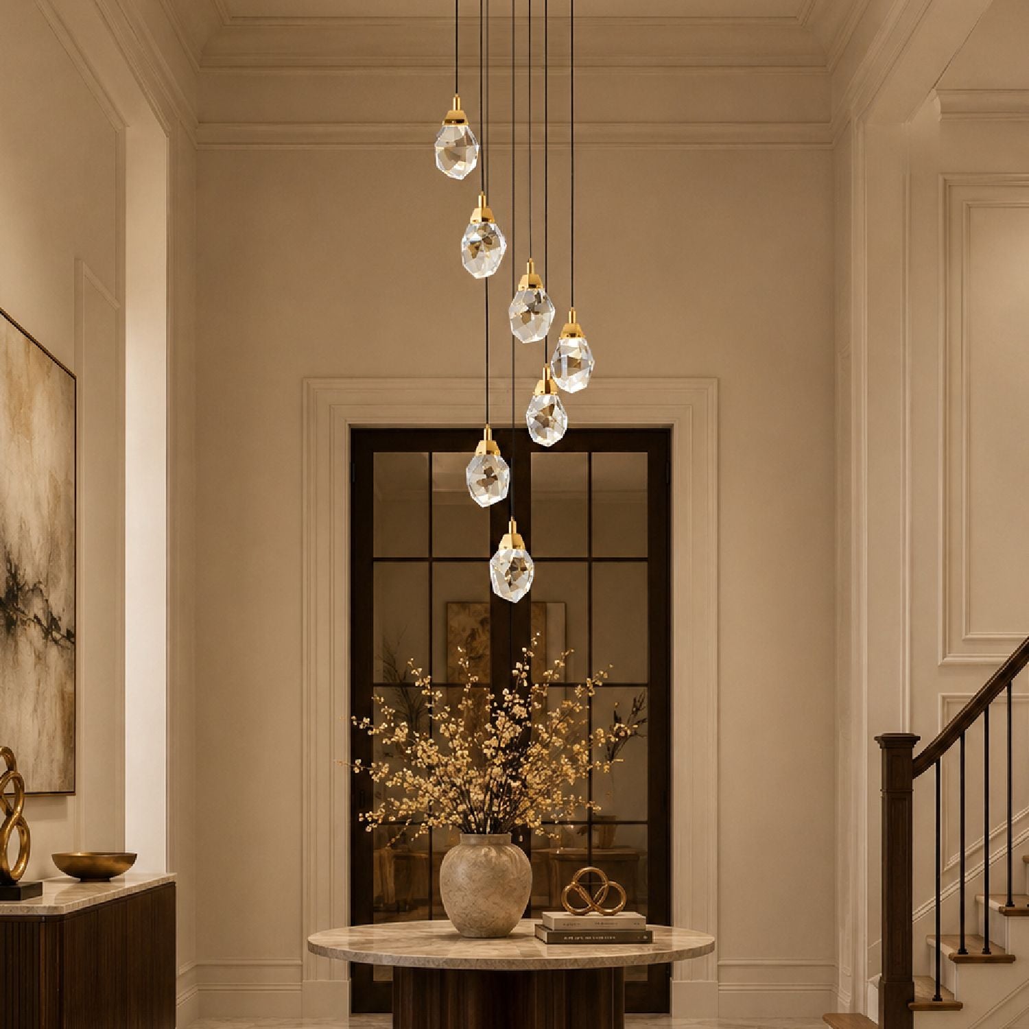 Nirvana Cascading Raindrop Chandelier — five tiered K9 crystal droplets suspended at varying heights, gold-tone fixtures, modern luxury design for high-ceiling spaces | Sofary Lighting
