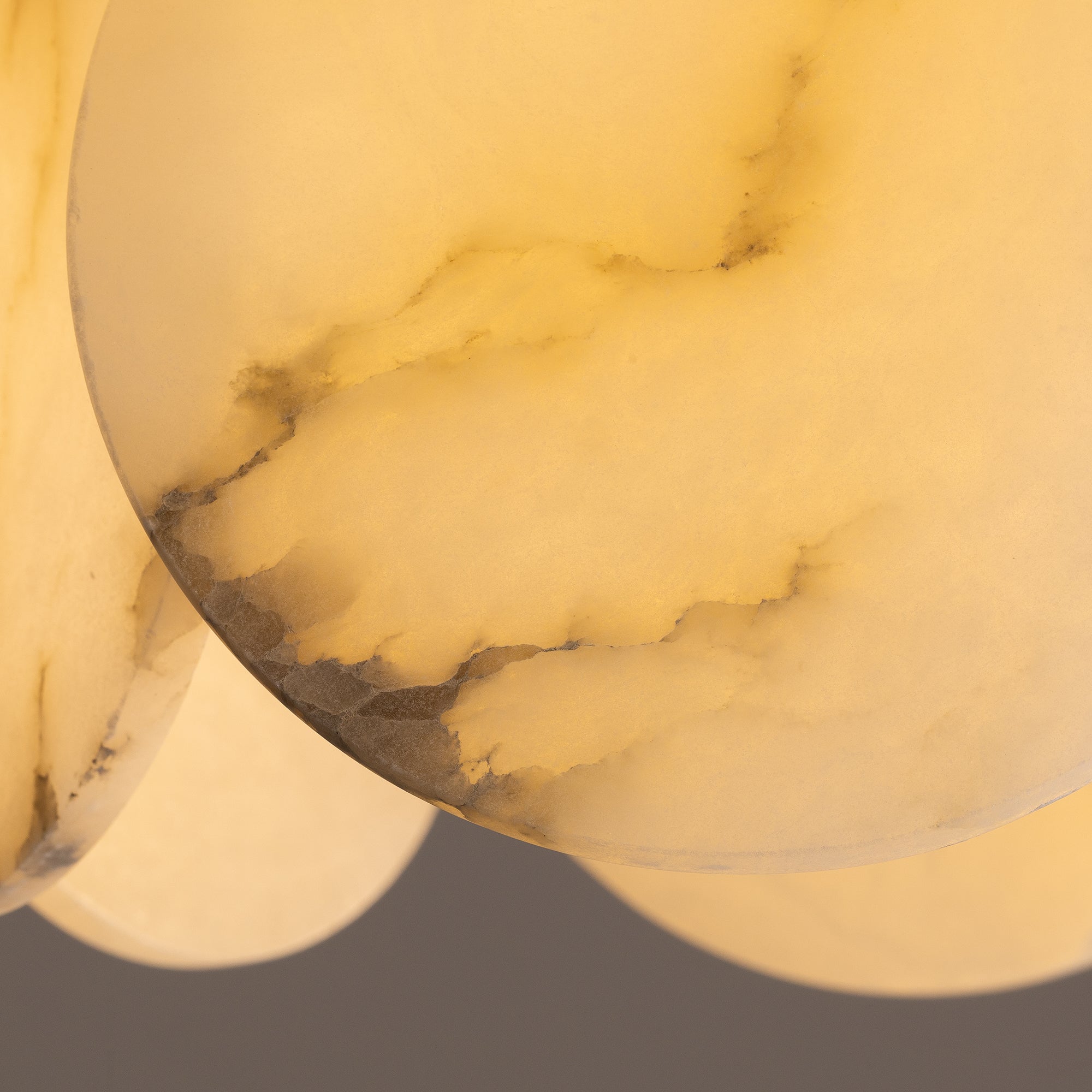 orlisse-modern-luxury-brass-alabaster-double-tier-disc-chandelier-light-on-details-CH496-B-20260512