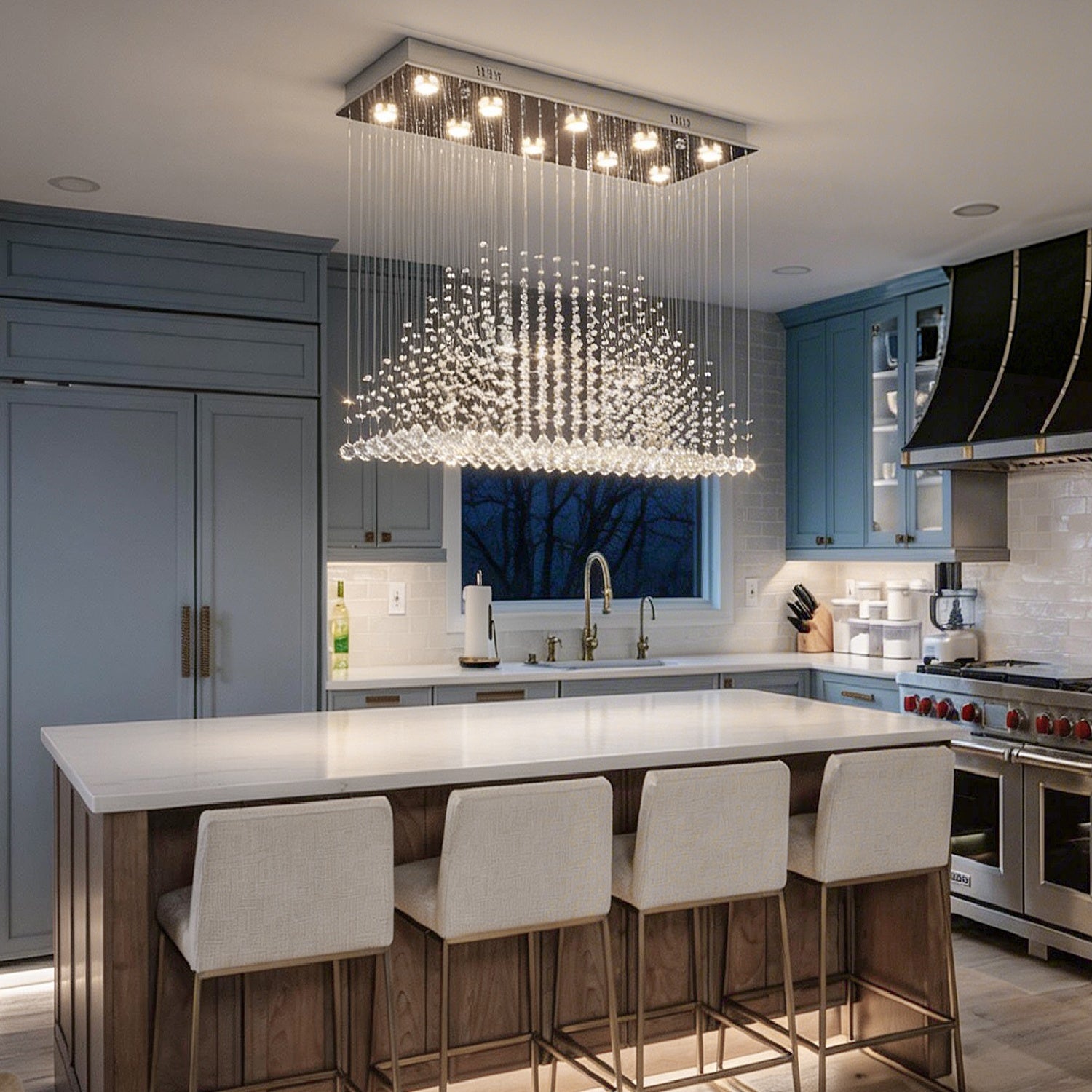 modern rectangular crystal chandelier lighting installed above kitchen island with seating area | Sofary Lighting