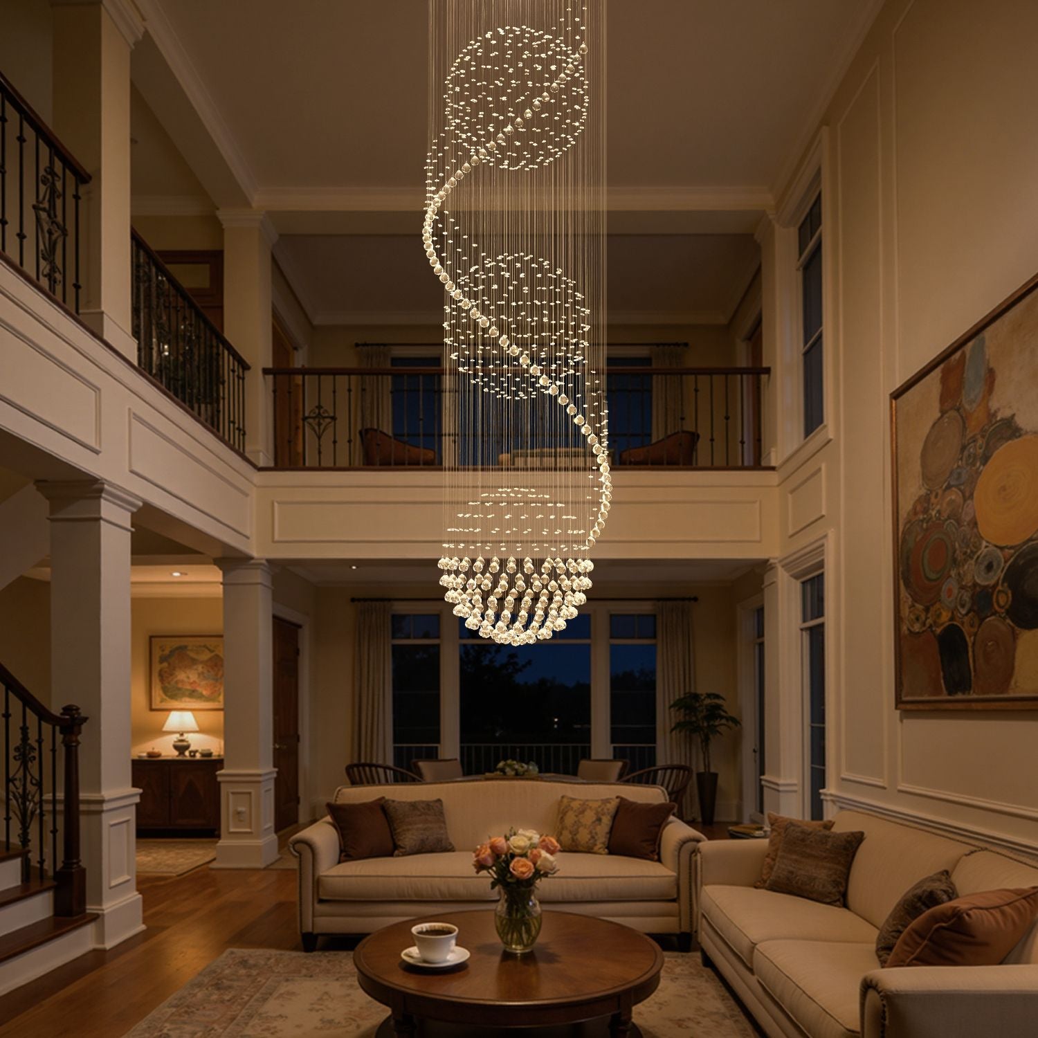 Three sphere raindrop crystal chandelier in a double height living room with staircase | Sofary