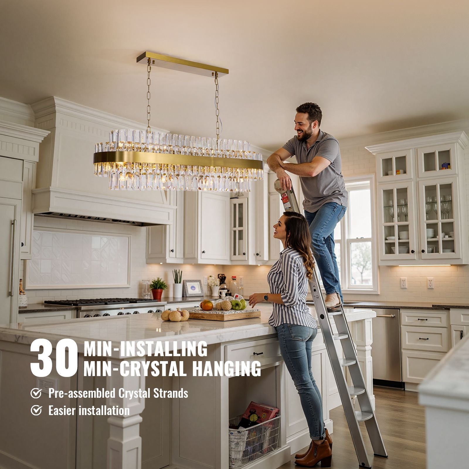 Valence Chandelier over white kitchen island — pre-assembled crystal strands enable 30-minute installation, brass gold finish matching modern cabinetry | Sofary Lighting