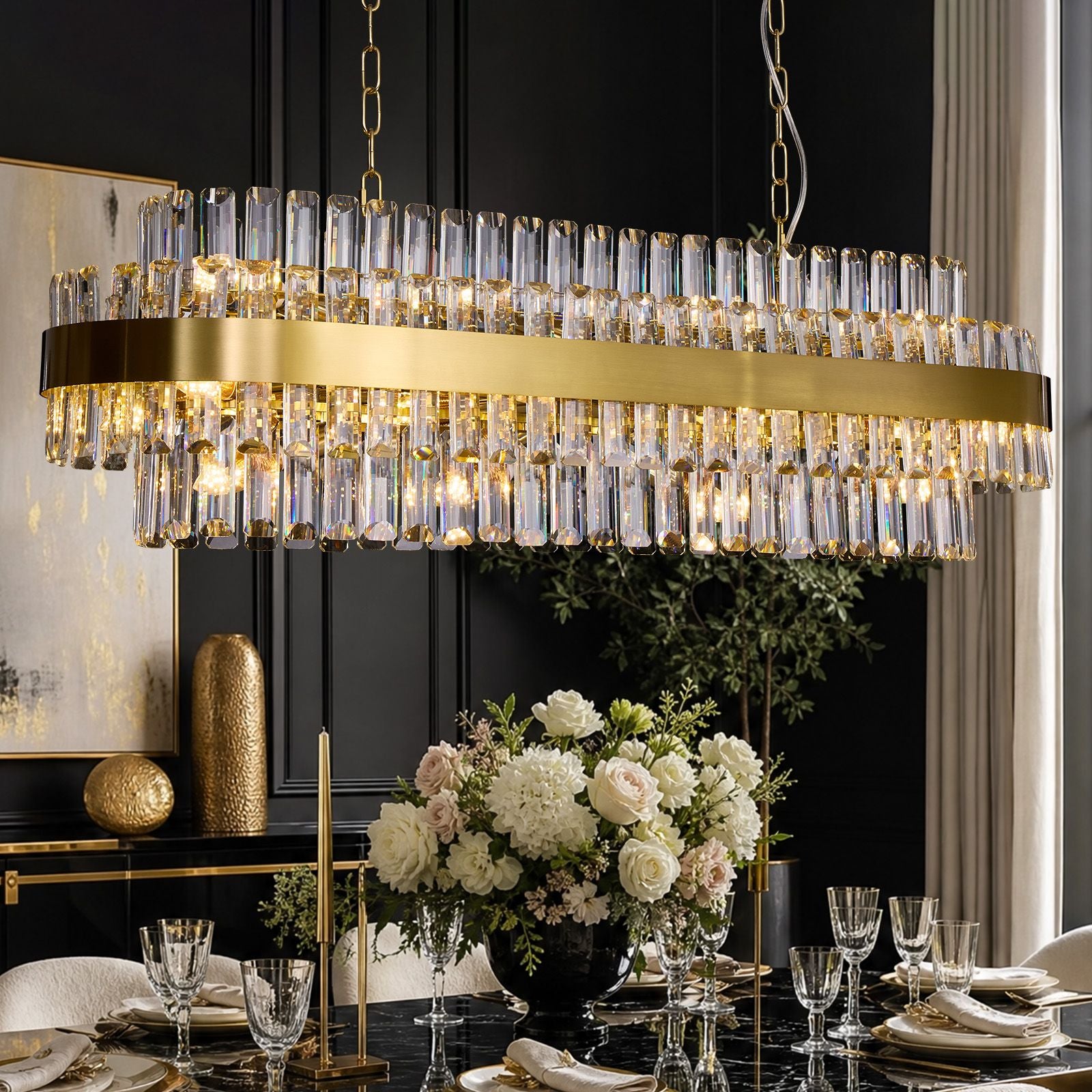 Valence Modern Large Luxury K9 Crystal Chandelier — rectangular gold frame with tiered raindrop crystal prisms, warm illuminated glow over elegant dining setting | Sofary Lighting