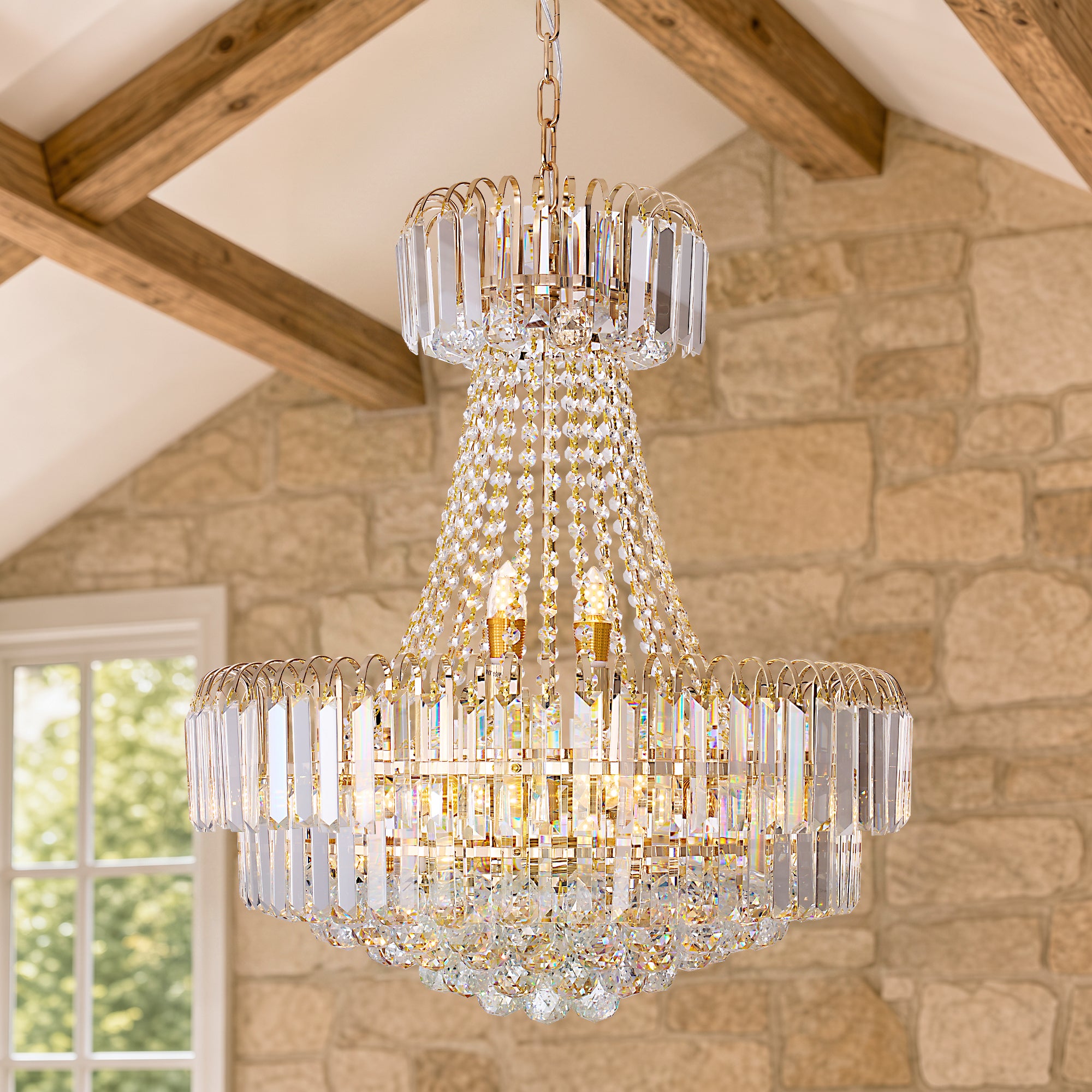 Valerisse gold crystal tiered empire chandelier close-up in a rustic foyer