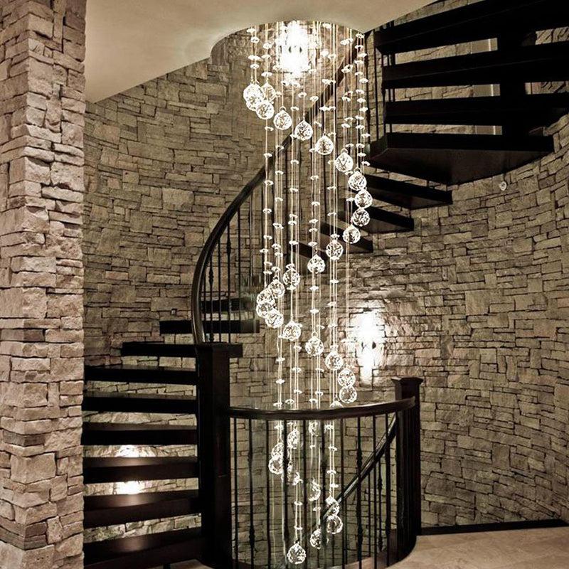 modern elegant k9 crystal spiral raindrop staircase chandelier lighting hanging in spiral staircase interior | Sofary Lighting