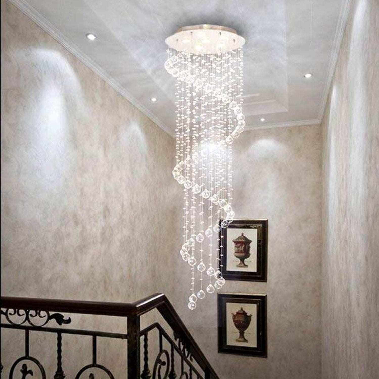 modern elegant k9 crystal spiral raindrop chandelier lighting fixture installed in stairwell hallway | Sofary Lighting